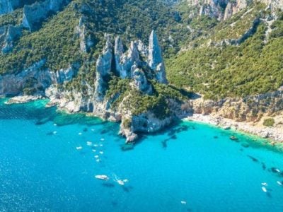 Behind Sardinia’s two most viral beaches, tables serve dishes of shepherds and charcoal burners