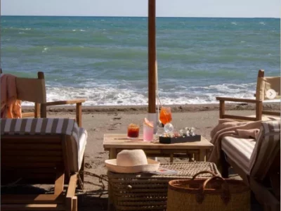Last days for a glass by the sea in the beach wine bar between Lazio and Tuscany