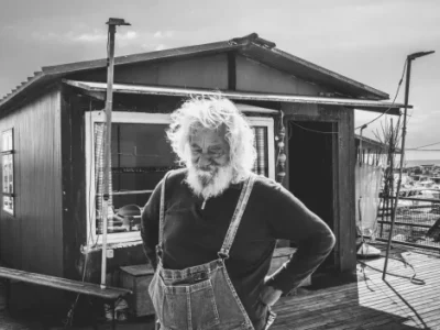 The fisherman who has lived on the sea for fifty years and now resists the assault of concrete