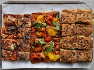 One of the best pizza al taglio in Rome is hidden in a tiny hole behind the Circo Massimo